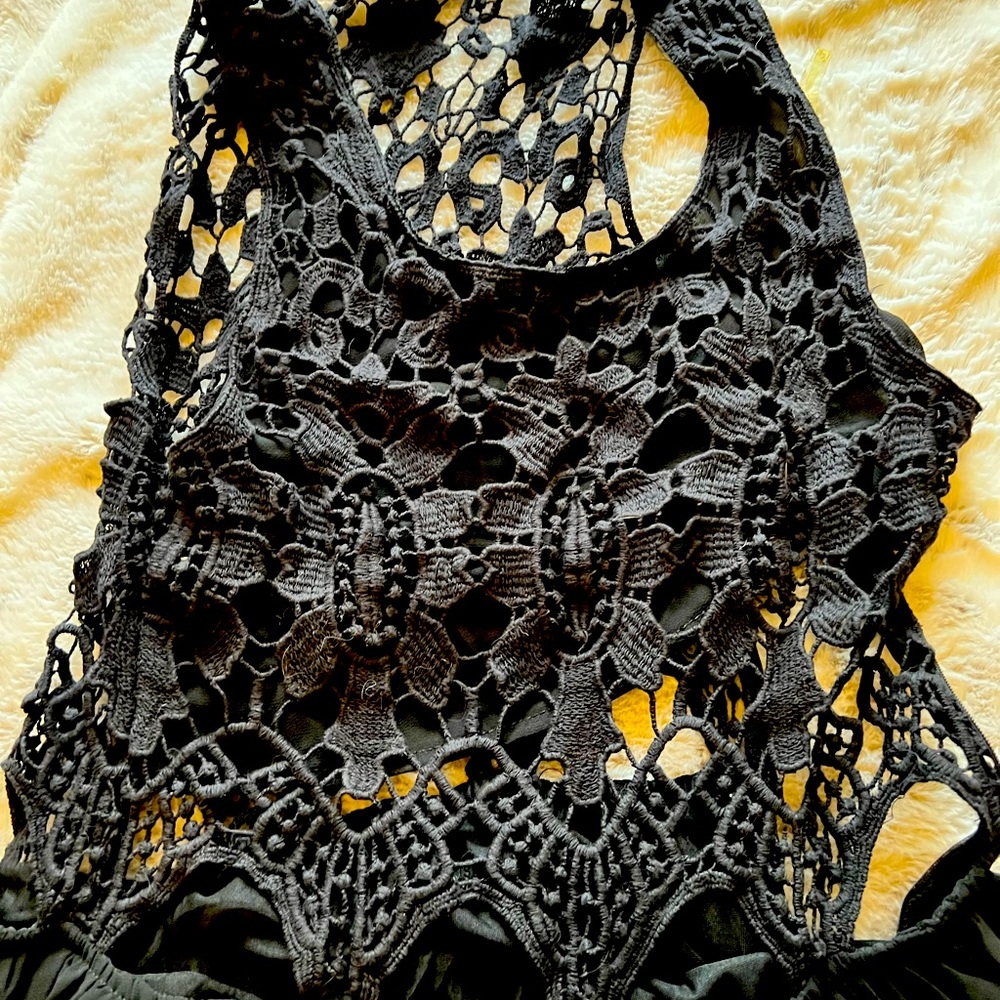 Large black floor length crochet dress. With short slip under. Long length